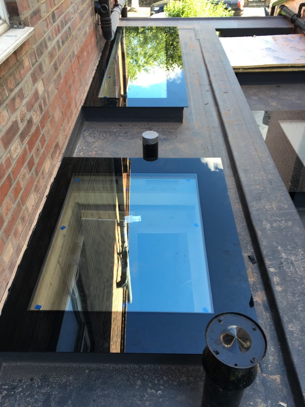 Multiple flat roof skylights on extension in Stamford Hill